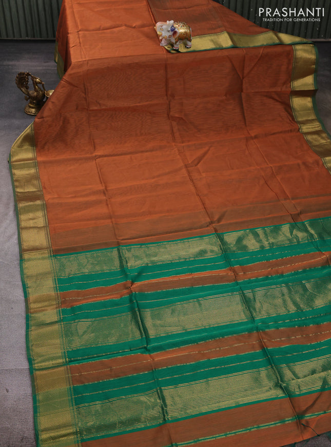 Maheshwari silk cotton saree rust shade and green with plain body and zari woven border
