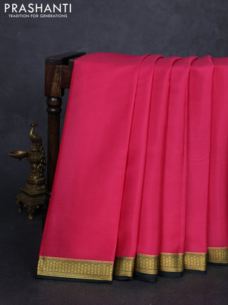Pure mysore silk saree peach pink and bottle green with plain body and zari woven border
