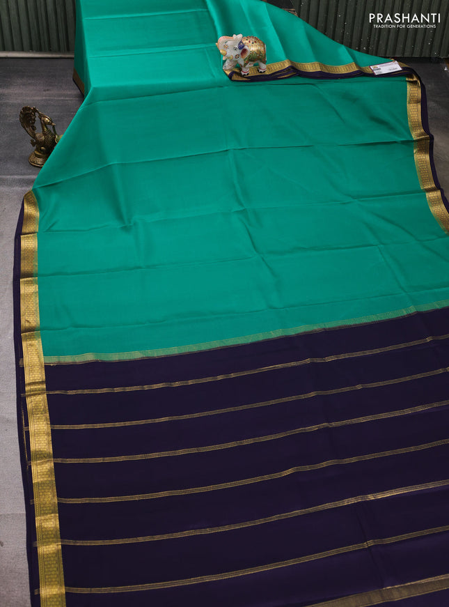Pure mysore silk saree teal green and navy blue with plain body and zari woven border