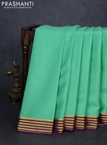 Pure mysore silk saree pista green and purple with plain body and zari woven border