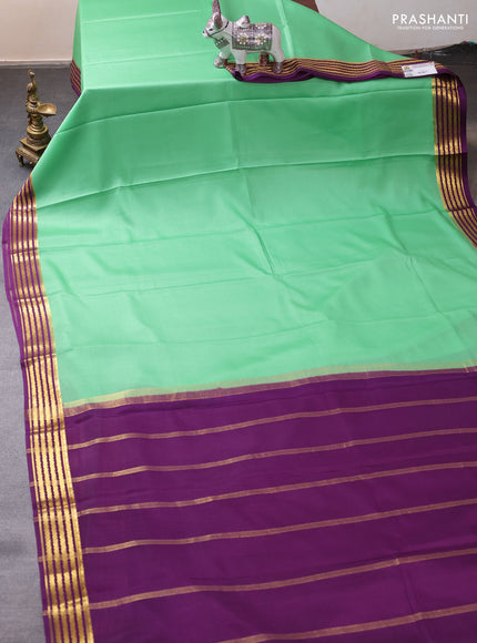 Pure mysore silk saree pista green and purple with plain body and zari woven border