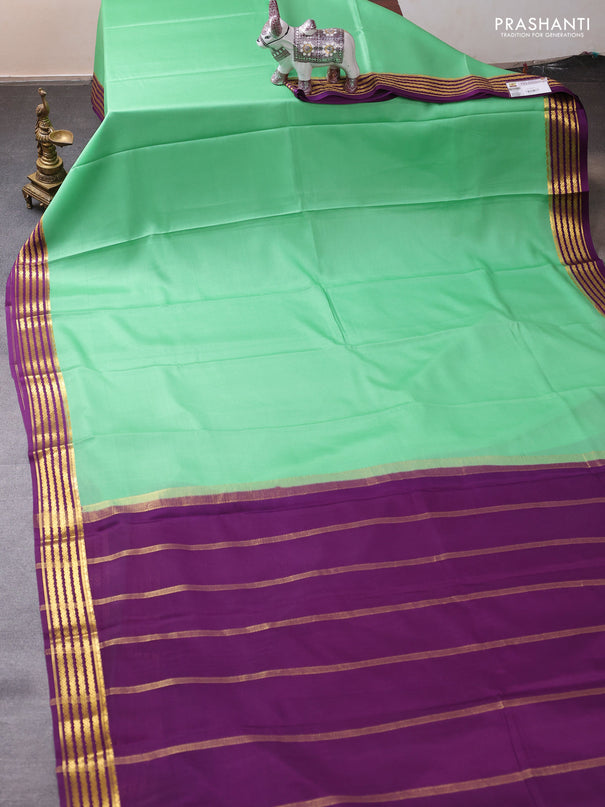Pure mysore silk saree pista green and purple with plain body and zari woven border