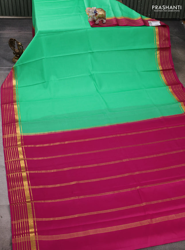 Pure mysore silk saree teal green and pink with plain body and zari woven border