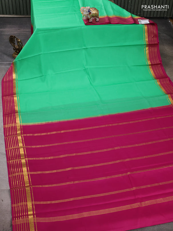 Pure mysore silk saree teal green and pink with plain body and zari woven border