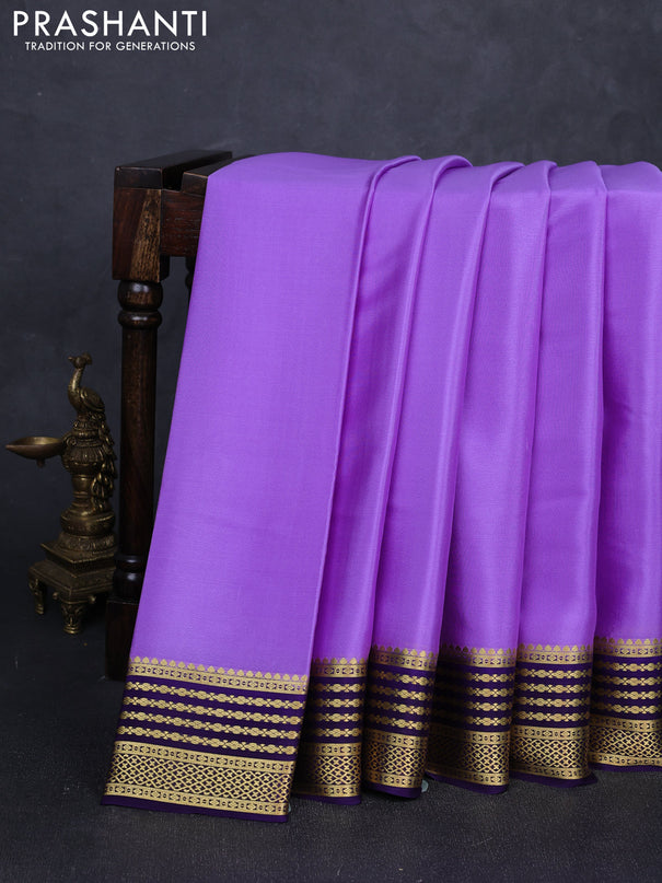 Pure mysore silk saree lavender and violet with plain body and zari woven border