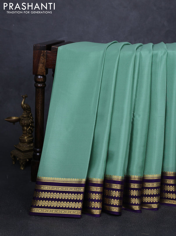 Pure mysore silk saree pastel green and violet with plain body and zari woven border