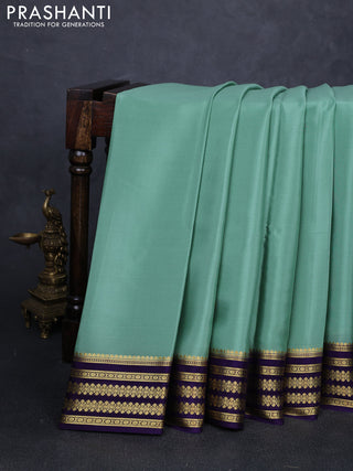 Pure mysore silk saree pastel green and violet with plain body and zari woven border
