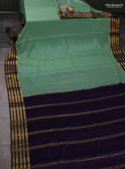 Pure mysore silk saree pastel green and violet with plain body and zari woven border