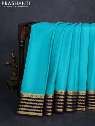 Pure mysore silk saree teal blue and violet with plain body and zari woven border