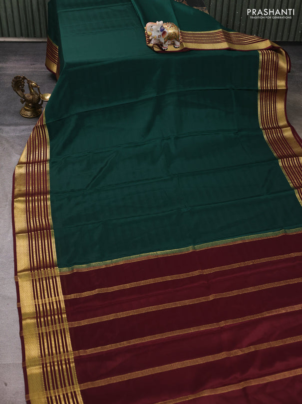 Pure mysore silk saree green and deep maroon with plain body and zari woven border