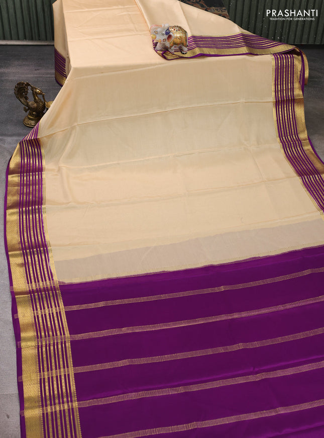 Pure mysore silk saree cream and purple with plain body and zari woven border