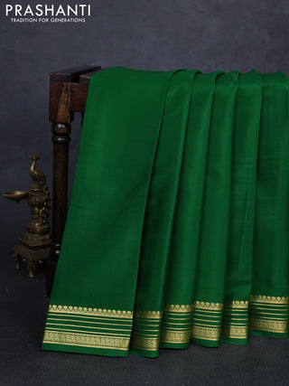 Pure mysore silk saree light green with plain body and zari woven border