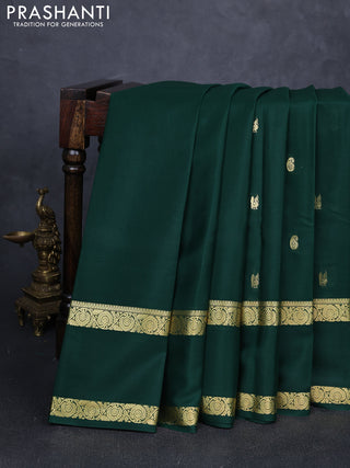 Pure mysore silk saree bottle green with plain body and rettapet zari woven border