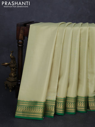 Pure mysore silk saree pista green and green with plain body and zari woven border
