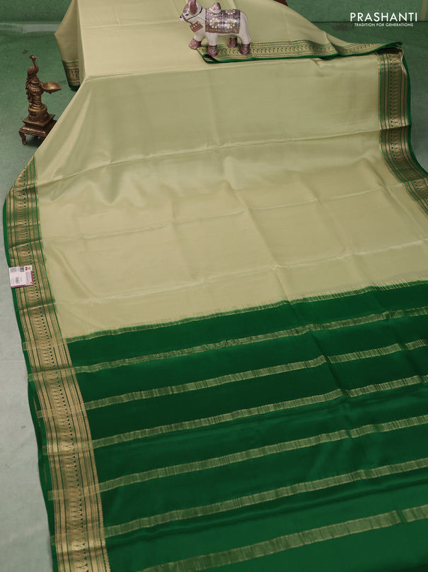 Pure mysore silk saree pista green and green with plain body and zari woven border