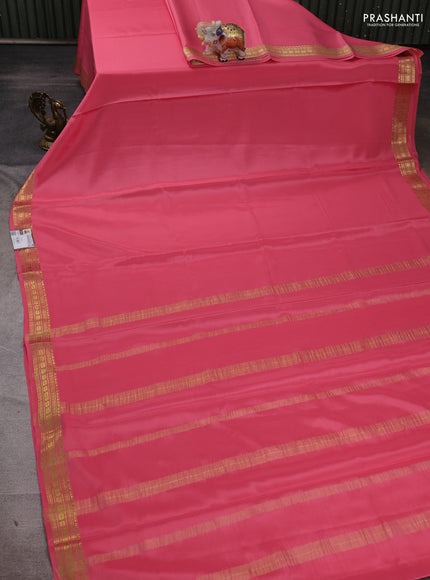 Pure mysore silk saree peach pink with plain body and zari woven border