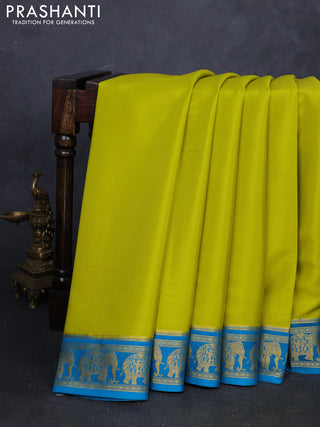 Pure mysore silk saree light green and teal blue with plain body and zari woven border