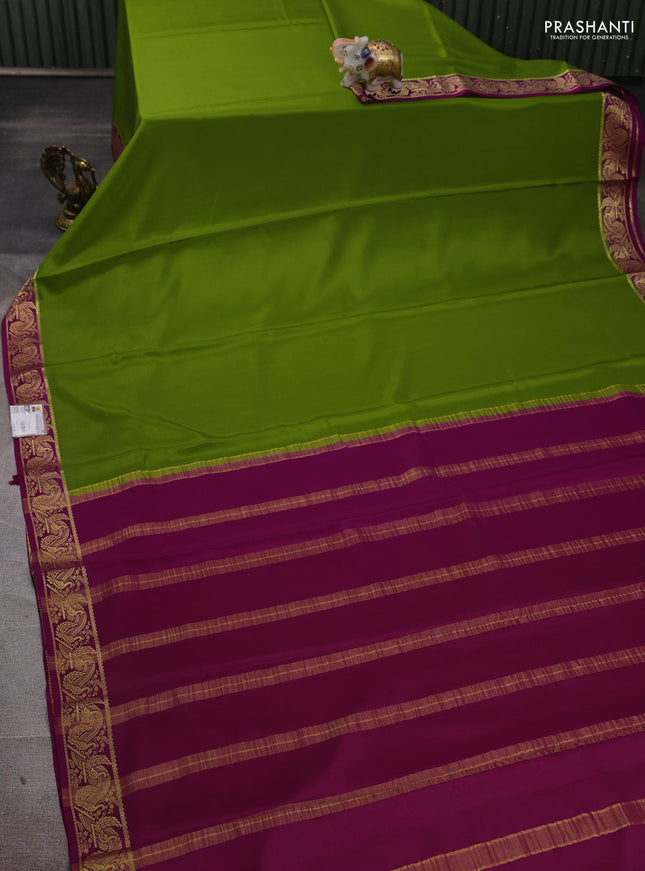 Pure mysore silk saree light green and purple with plain body and zari woven border
