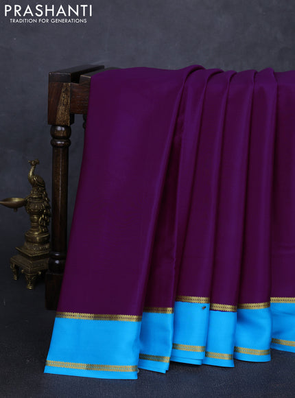 Pure mysore silk saree purple and cs blue with plain body and rettapet zari woven buttas
