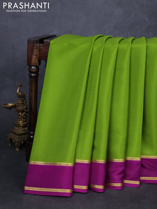 Pure mysore silk saree light green and purple with plain body and rettapet zari woven buttas