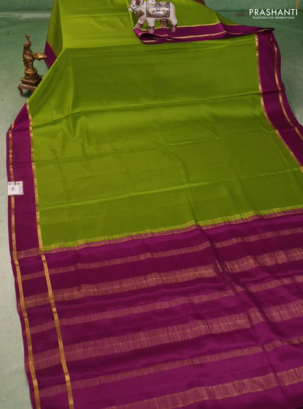 Pure mysore silk saree light green and purple with plain body and rettapet zari woven buttas