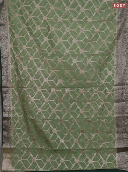 Semi chiniya silk saree pastel green and green with allover thread & zari weaves and woven border