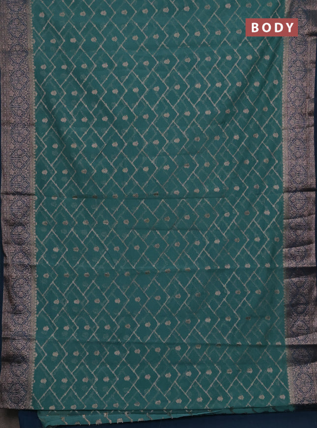 Semi chiniya silk saree teal green shade and peacock green with allover thread & zari weaves and woven border