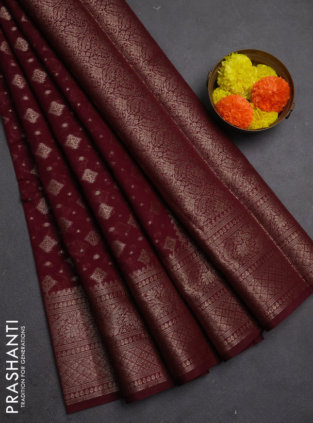 Semi chiniya silk saree wine shade with allover thread & zari woven buttas and woven border