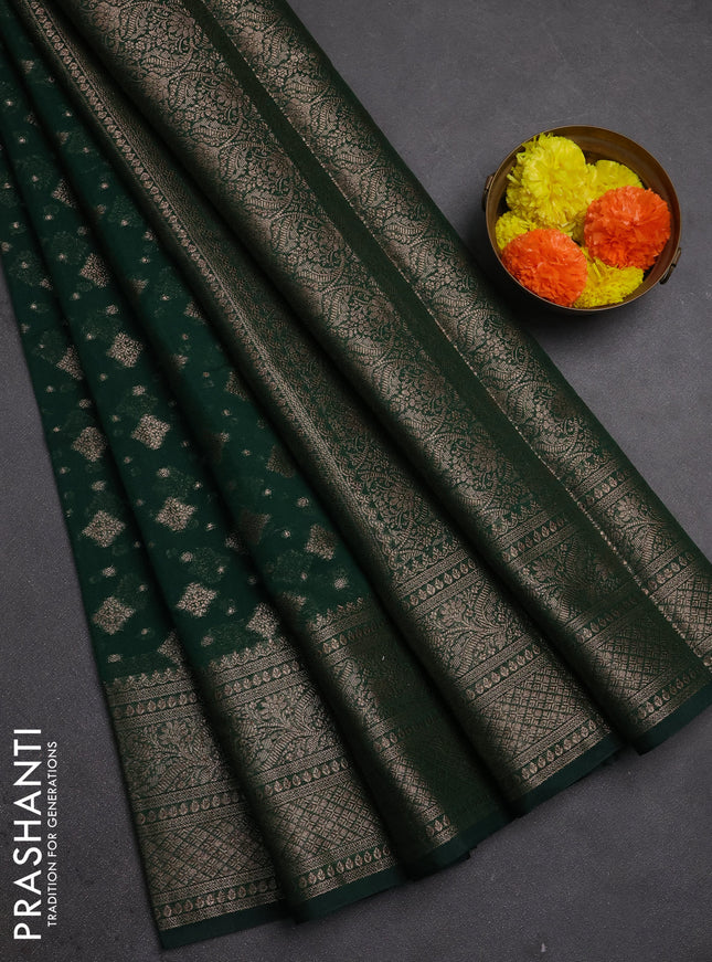 Semi chiniya silk saree dark green with allover thread & zari woven buttas and woven border