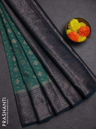 Semi chiniya silk saree teal green shade and peacock green with allover thread & zari weaves and woven border