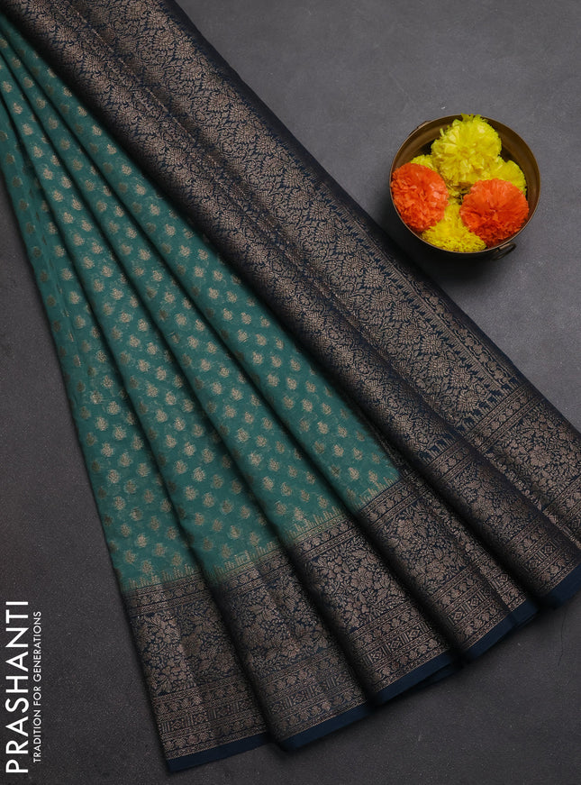 Semi chiniya silk saree teal green shade and peacock green with allover thread & zari woven buttas and woven border