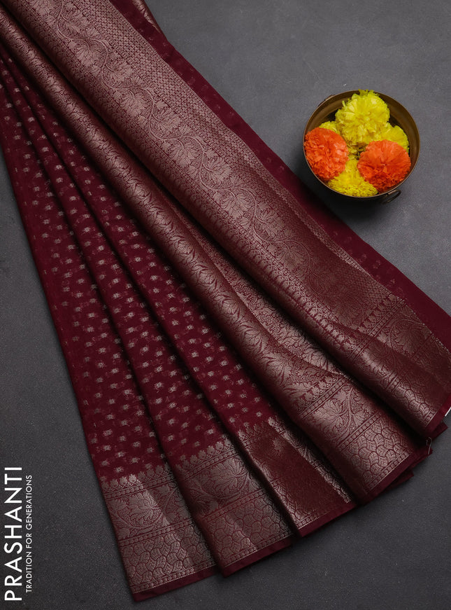 Semi chiniya silk saree wine shade with allover thread & zari woven buttas and woven border