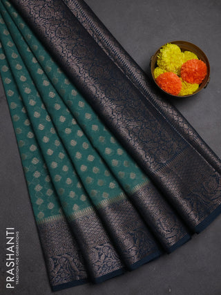 Semi chiniya silk saree teal green shade and peacock green with allover thread & zari woven buttas and woven border