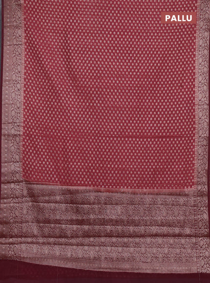 Semi chiniya silk saree dark peach and deep maroon with allover thread & zari woven buttas and woven border