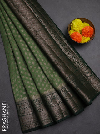 Semi chiniya silk saree pastel green and bottle green with allover thread & zari woven buttas and woven border