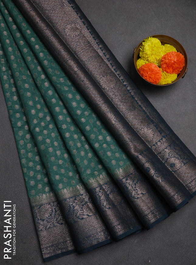 Semi chiniya silk saree teal green shade and peacock green with allover thread & zari woven buttas and woven border