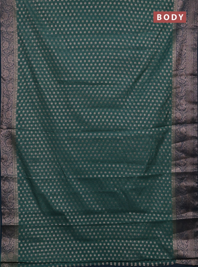 Semi chiniya silk saree teal green shade and peacock green with allover thread & zari woven buttas and woven border