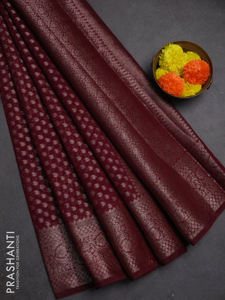 Semi chiniya silk saree wine shade with allover thread & zari woven paisley buttas and woven border