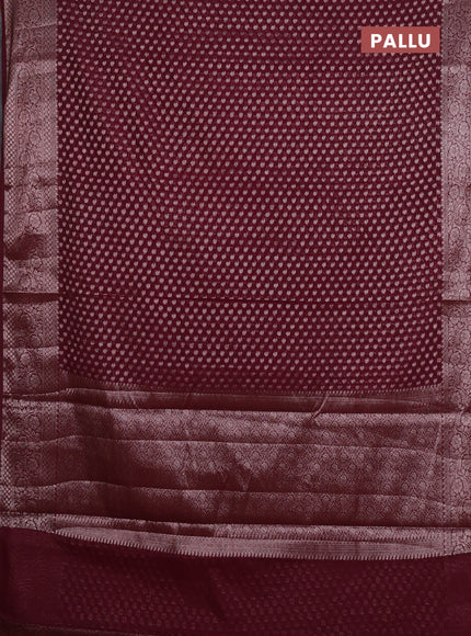 Semi chiniya silk saree wine shade with allover thread & zari woven paisley buttas and woven border