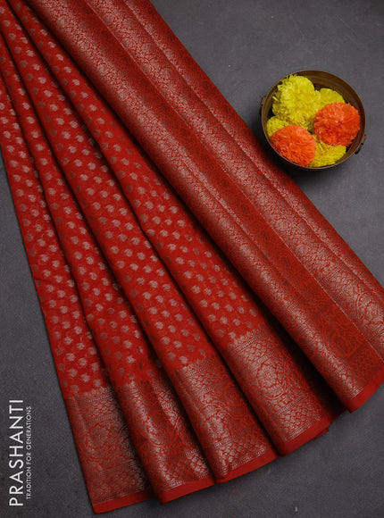 Semi chiniya silk saree orange with allover thread & zari woven paisley buttas and woven border