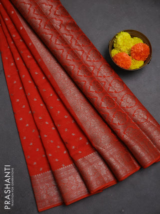 Semi chiniya silk saree rustic orange with allover thread & zari woven buttas and woven border