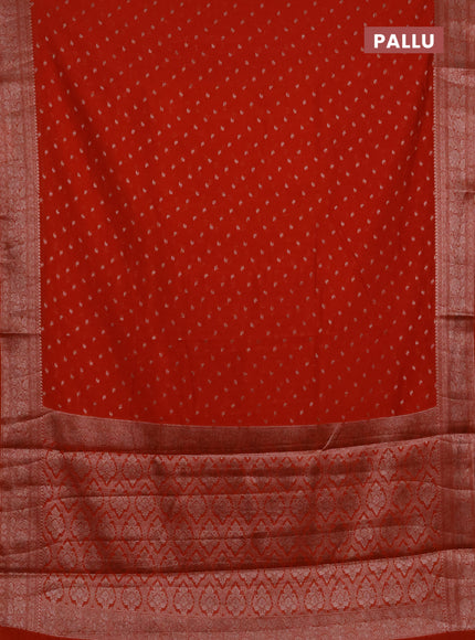 Semi chiniya silk saree rustic orange with allover thread & zari woven buttas and woven border