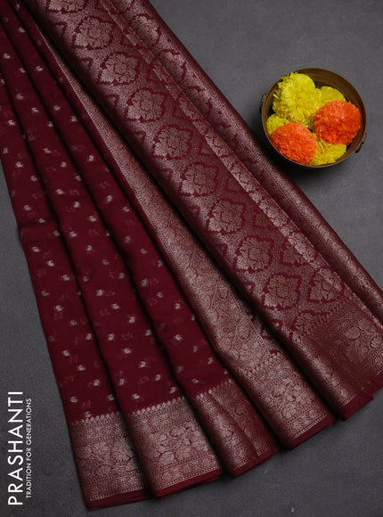 Semi chiniya silk saree wine shade with allover thread & zari woven buttas and woven border