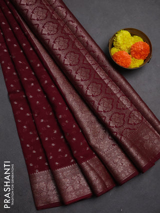 Semi chiniya silk saree wine shade with allover thread & zari woven buttas and woven border