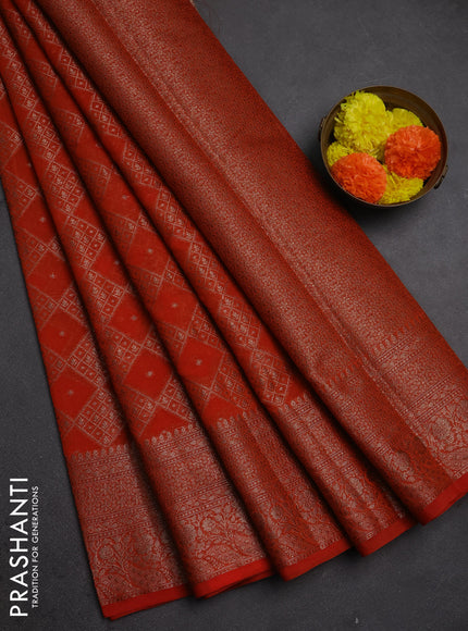 Semi chiniya silk saree rustic orange with allover thread & zari weaves and woven border