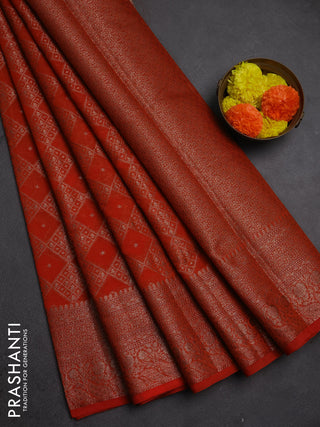 Semi chiniya silk saree rustic orange with allover thread & zari weaves and woven border