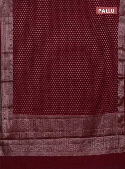 Semi chiniya silk saree wine shade with allover thread & zari woven buttas and woven border
