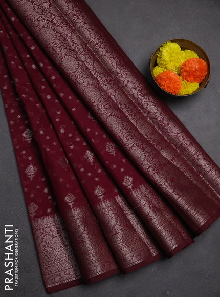 Semi chiniya silk saree wine shade with allover thread & zari woven buttas and woven border