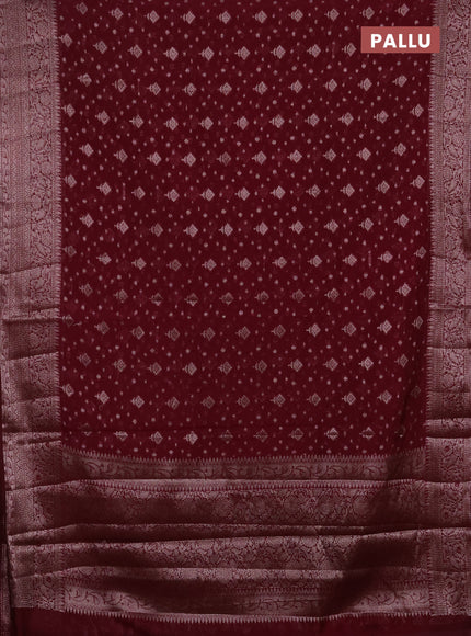 Semi chiniya silk saree wine shade with allover thread & zari woven buttas and woven border