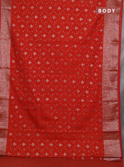 Semi chiniya silk saree orange with allover thread & zari woven buttas and woven border